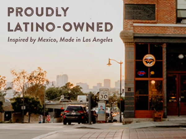 Street scene with a building labeled 'Proudly Latino-owned' inspired by Mexico, Made in Los Angeles.