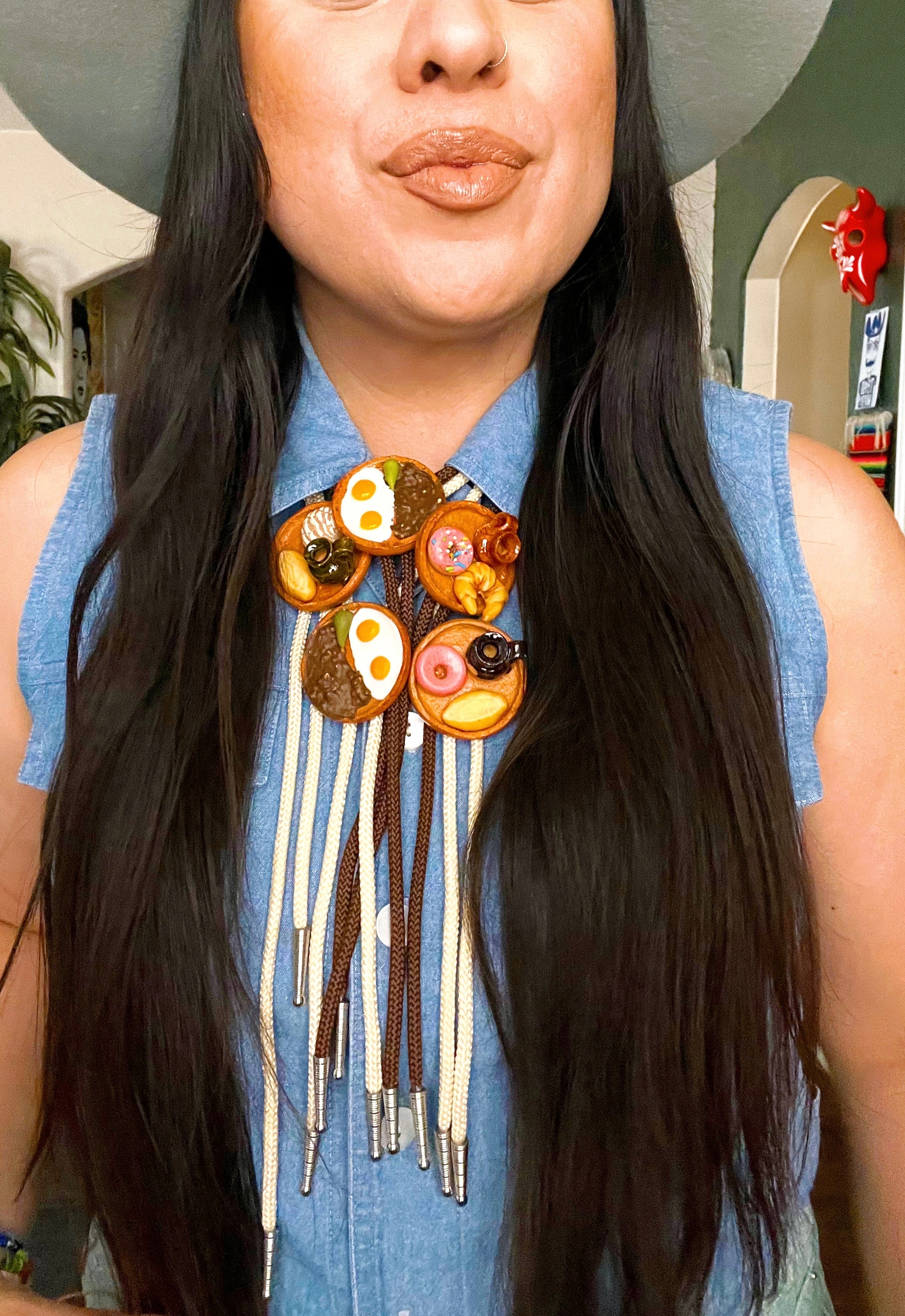 Bolo ties with traditional Mexican food plates styled with jean top