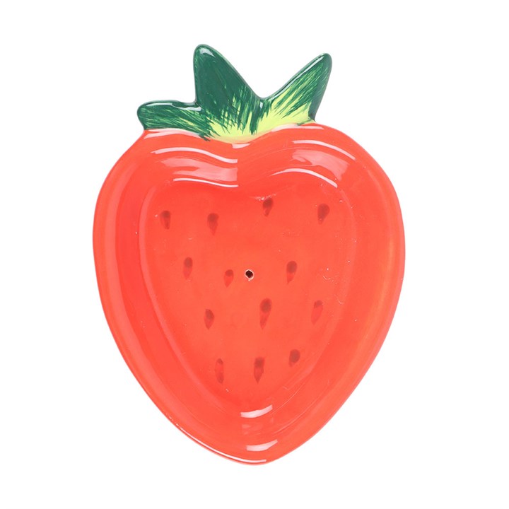 Red strawberry-shaped object with green leaves on a white background