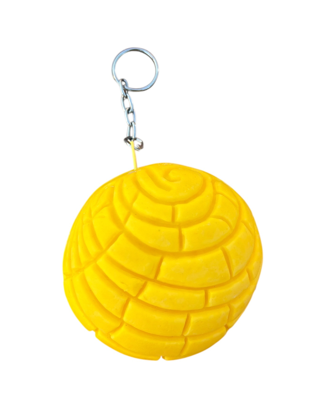 Yellow concha pan dulce coin purse on a white background